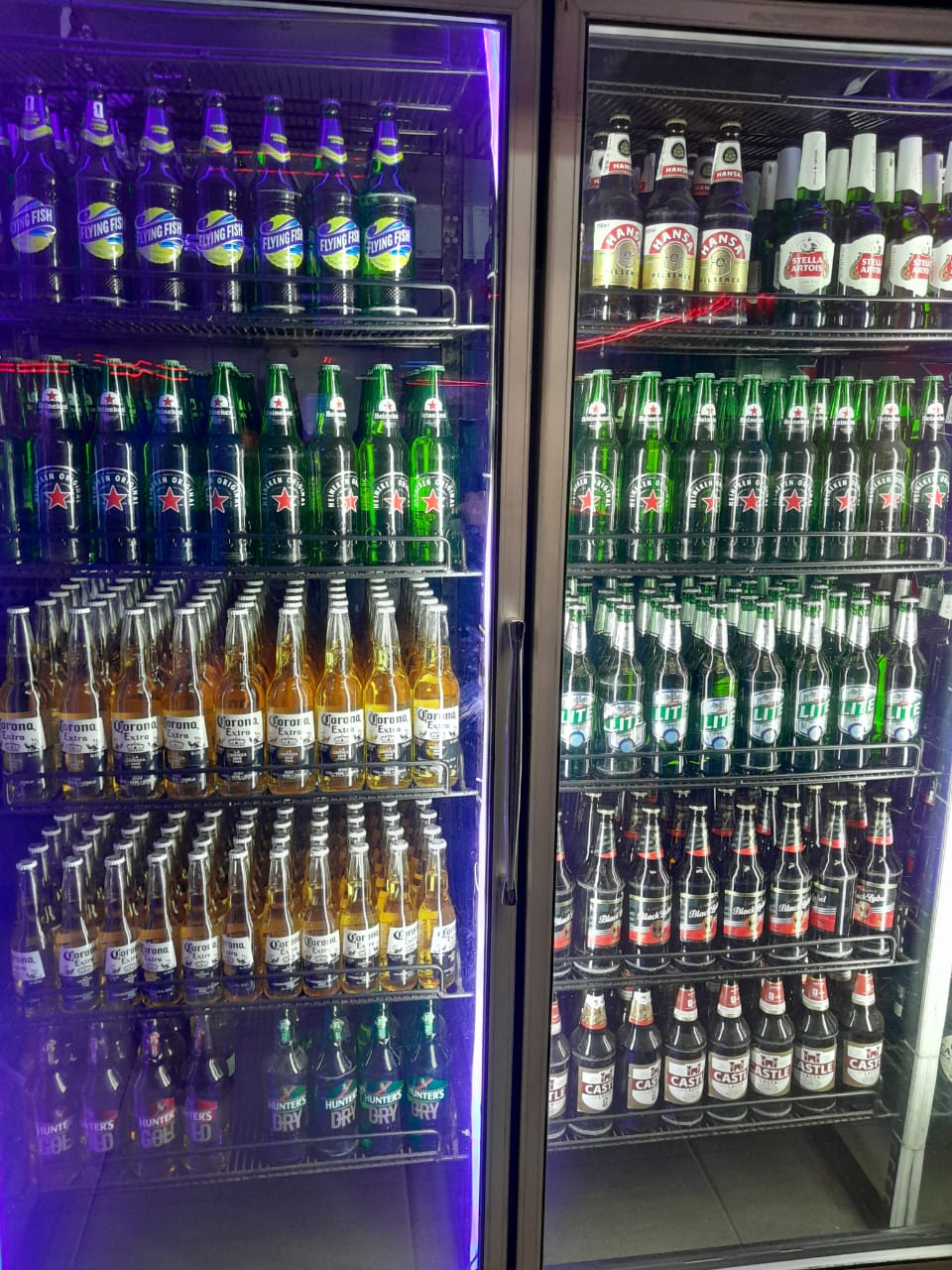 Fully stocked beer fridges at Cheeky Tiger Randburg